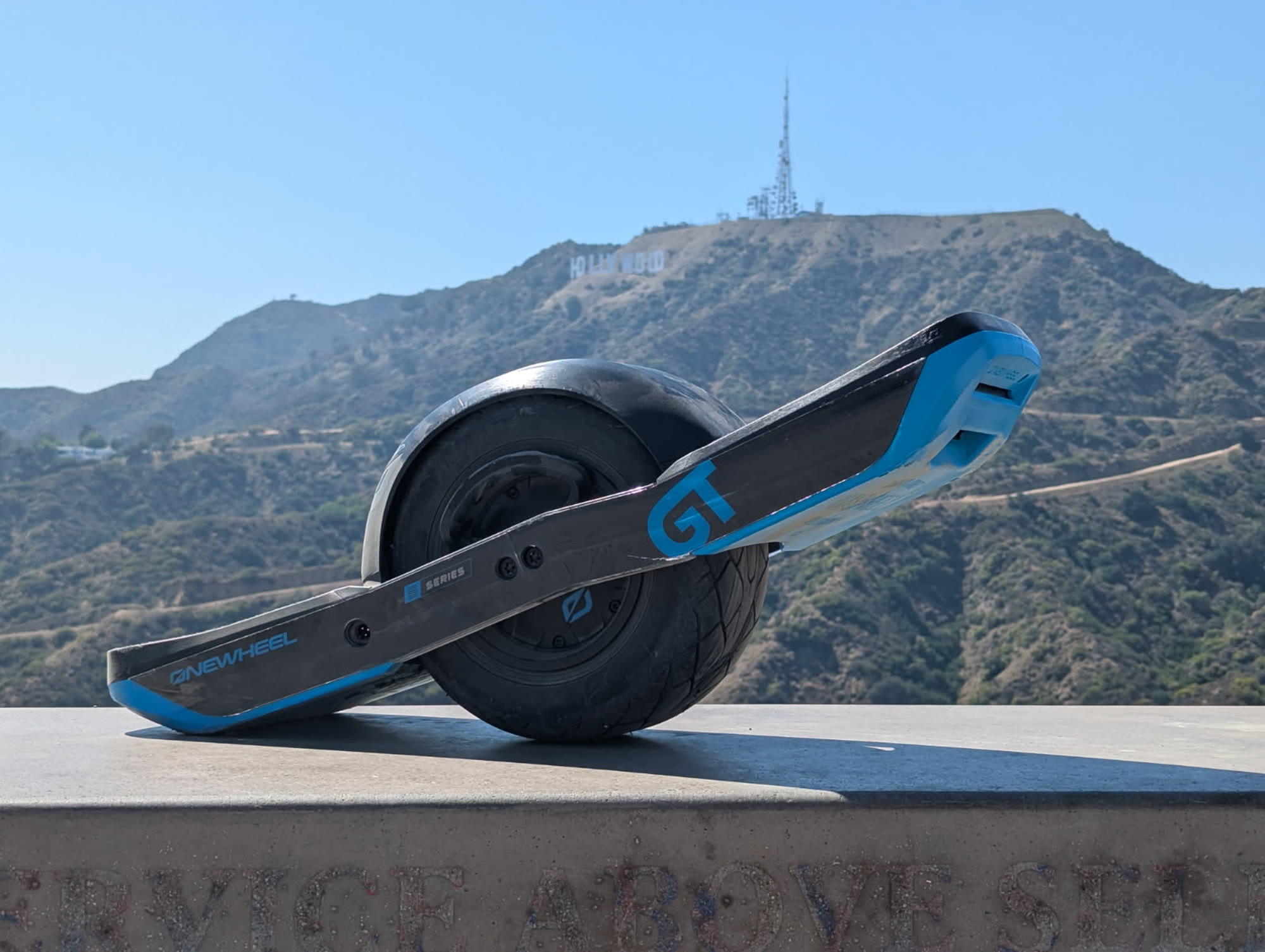 The actual GT-S rental board photographed with the Hollywood sign behind it